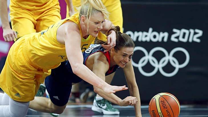 Fired up ... Lauren Jackson, left, fights Natalie Stafford for the ball. Photo: Reuters