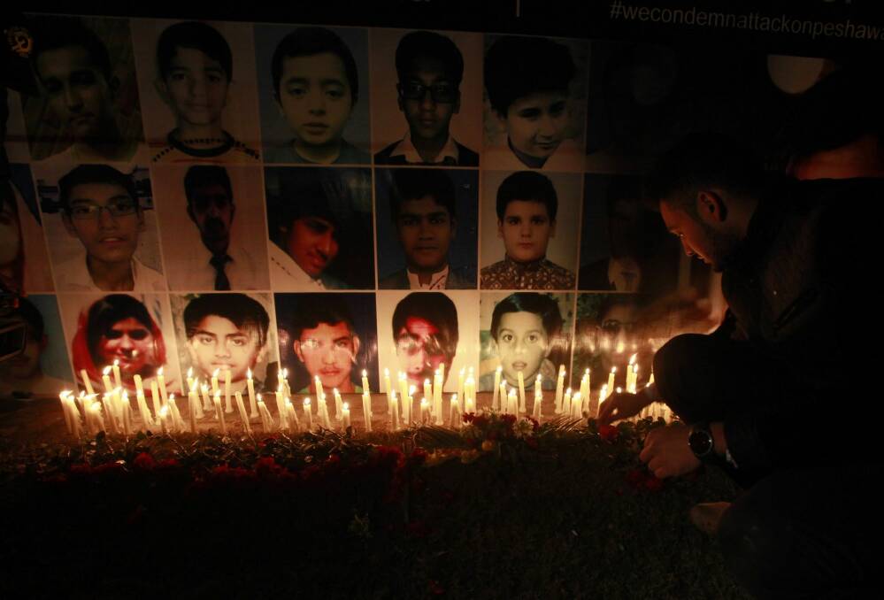 Deaths: A makeshift memorial for the victims of the school attack. Photo: Mohsin Raza