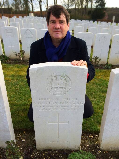 Chris Latham at his great-uncle's grave. Photo: Picasa