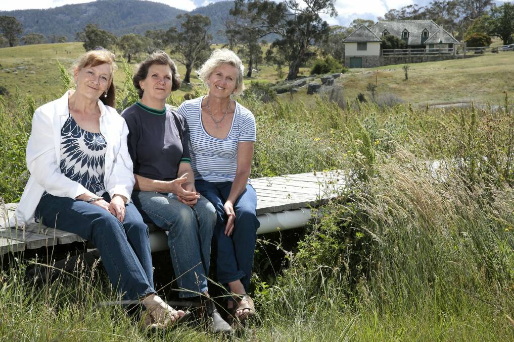 Sisters Trish, Jane and Anne Booth at Gudgenby Homestead, the area they grew up in.  Photo: Jeffrey Chan