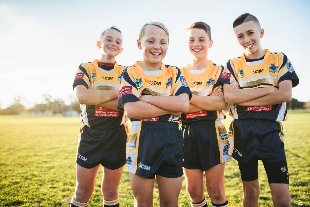 Kai Callaway (second from right) with his Tuggeranong Buffalos  team mates. Kai will be carrying the Queen's Baton for the Commonwealth Games in Canberra on Thursday at the National Arboretum about 10.15am.
 Photo: Rohan Thomson