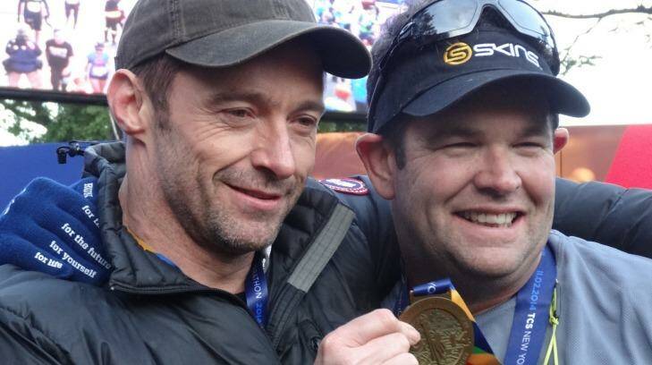 A teary Hugh Jackman met best friend Gus Worland at the finish line of the NYC marathon. Photo: Triple M’s Grill Team