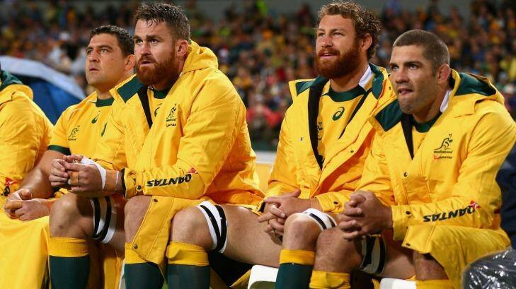 Josh Mann-Rea, far left, on the Wallabies bench on Saturday night in Perth. Photo: Getty Images