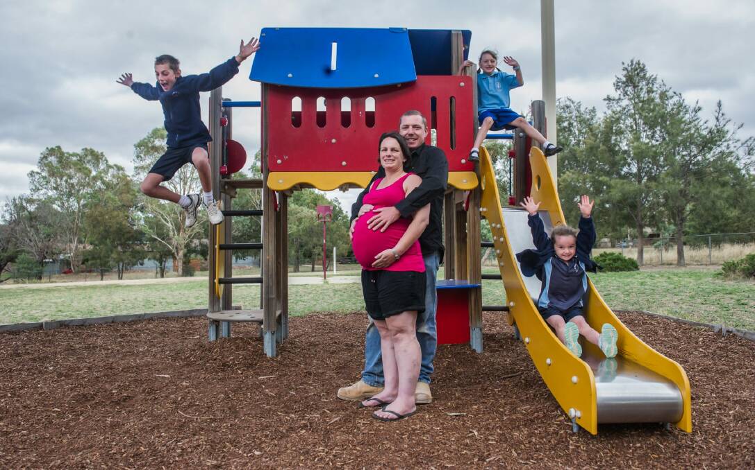 Emma and Matt Keen, with children Patrick, 11; Laura, seven, and Lily, five will be welcoming rare identical triplets in the next couple of weeks. Photo: karleen minney