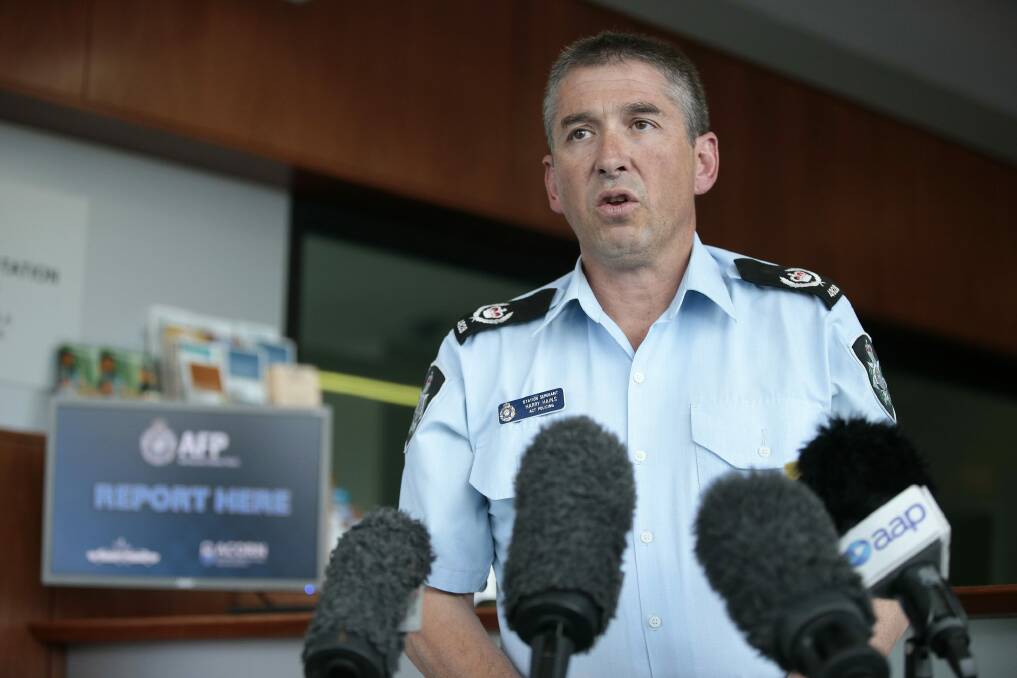 ACT Policing sergeant Harry Hains speaking to the media at Woden Police Station after a nine-week-old baby was taken from an O'Malley home on Sunday.  Photo: Jeffrey Chan