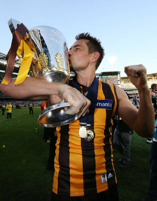 Hawthorn's AFL premiership cups are coming to Canberra. Photo: Michael Dodge