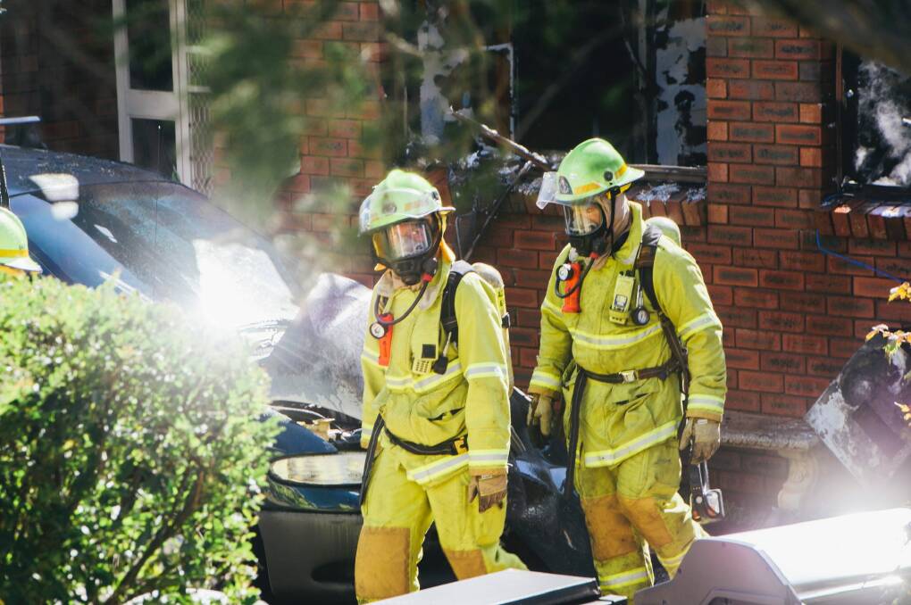 Firefighters at the house fire on Derry St in Monash. Photo: Rohan Thomson