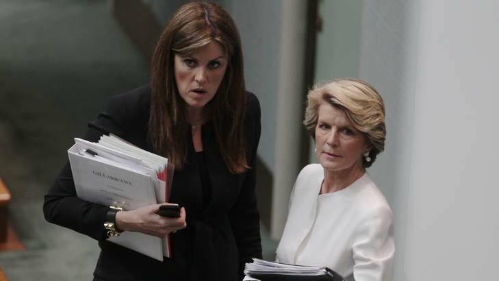 Opposition Leader Tony Abbott's chief of staff Peta Credlin speaks with Deputy Opposition Leader Julie Bishop on Monday. Photo: Alex Ellinghausen