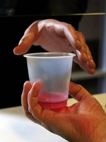 A cup of methadone. Photo: Colleen Petch