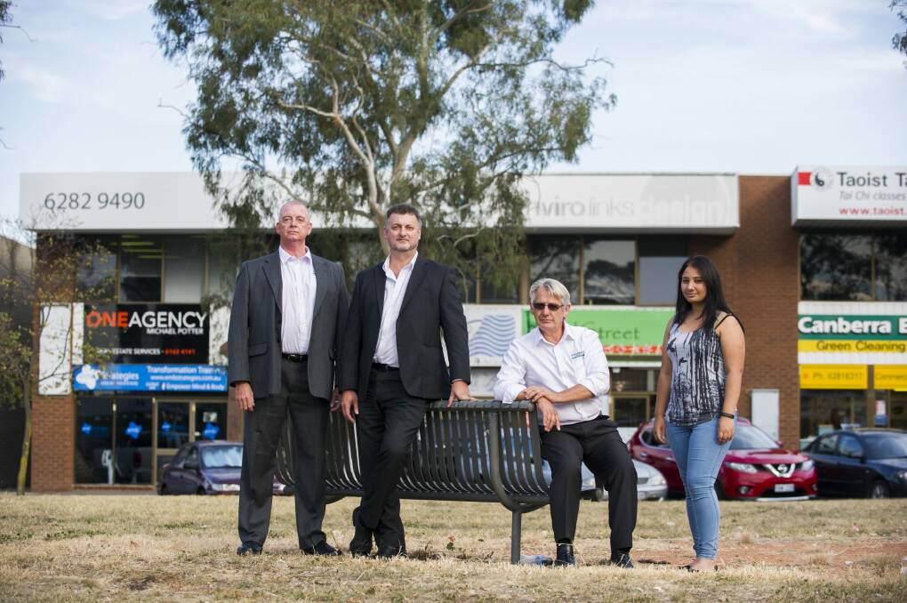 Phillip Business Community members Ian Whiteford and Dan Holliday, president Robert Issell and secretary Serena Singh, who want to see communal areas made more attractive for customers and workers. Photo: Rohan Thomson