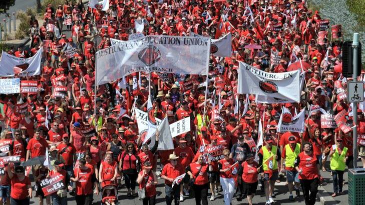 Lesson for the day: Thousands of teachers marched from Hisense Arena to Parliament House to protest over pay and conditions. Photo: Michael Clayton-Jones