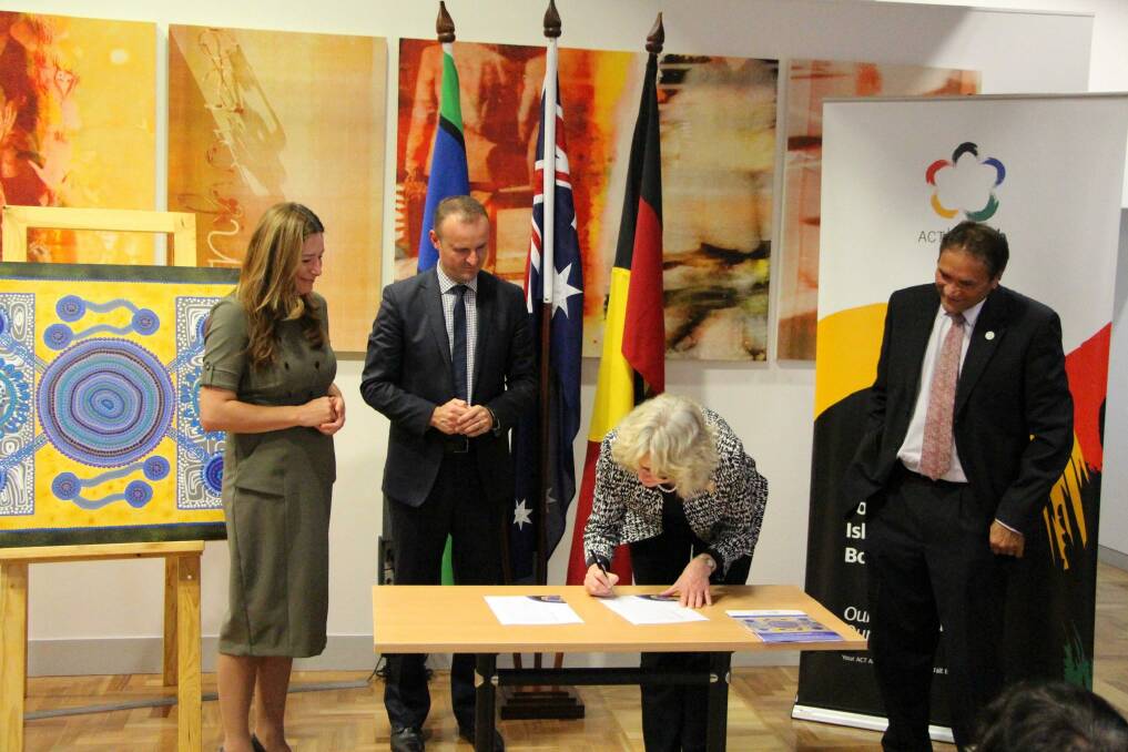 Minister Yvette Berry, Chief Minister Andrew Barr, Head of Service Kathy Leigh and Aboriginal and Torres Strait Islander Elected Body chair Rod Little sign the new Indigenous agreement. Photo: Supplied