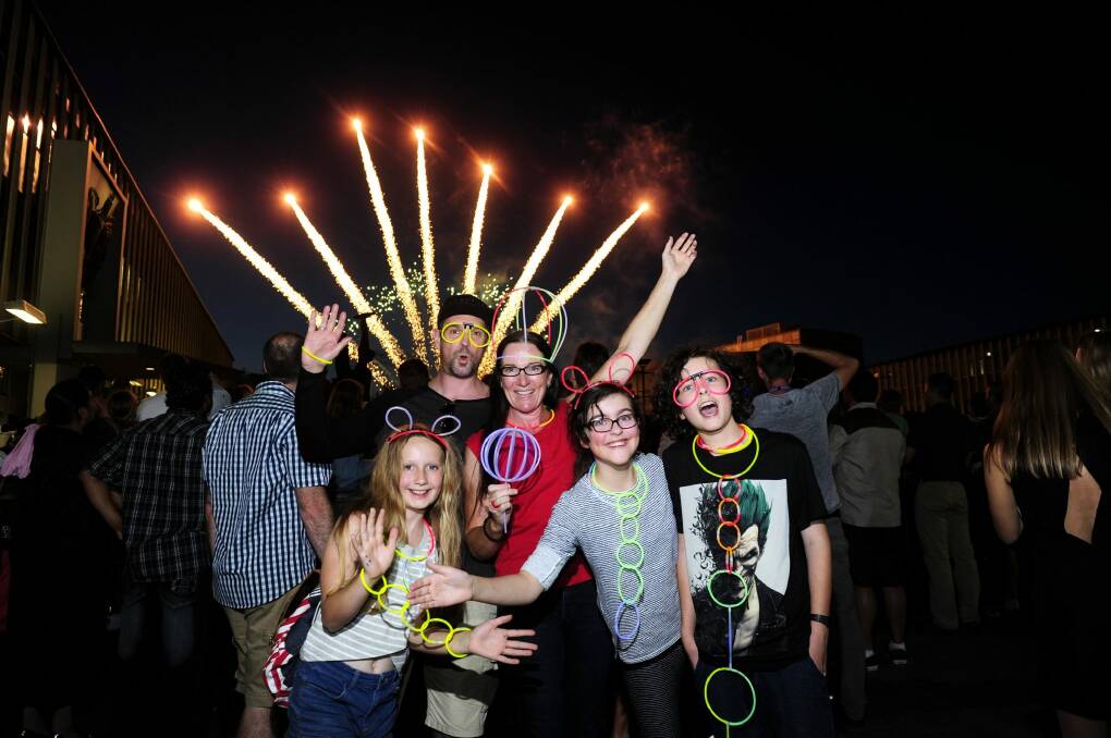  Celebrating New Years Eve at Civic Square in Canberra are from left, Yasmine Newitt,11 of Holt, Peter Vast of Holt, Katrina Newitt of Holt, Llewella Yabsley,10 and Johann Yabsley,12 both of Page.  Photo: Melissa Adams