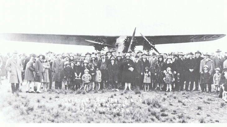 When Sir Charles Kingsford Smith landed at Canberra aerodrome in 1928, a crowd turned to to greet him. Photo: Supplied