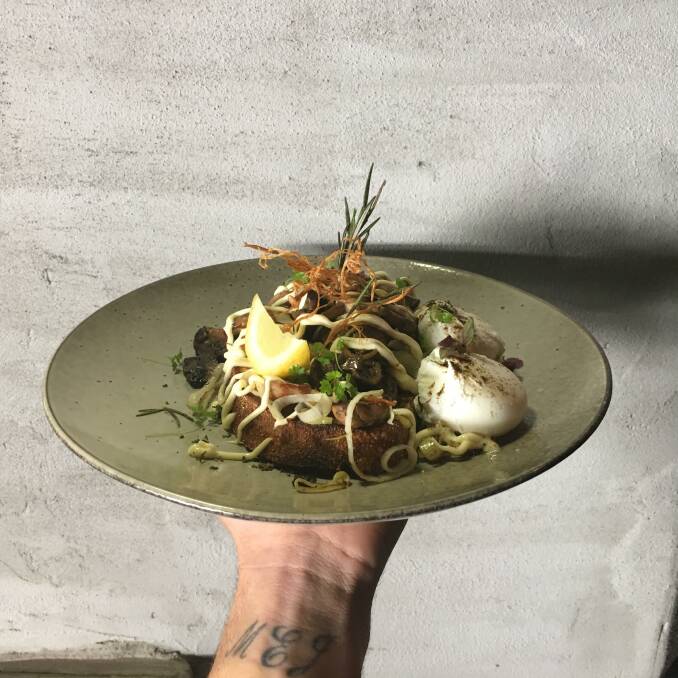 Loads of mushrooms, leeks, marsala and kewpie on sourdough, with a side of eggs. Photo: Supplied