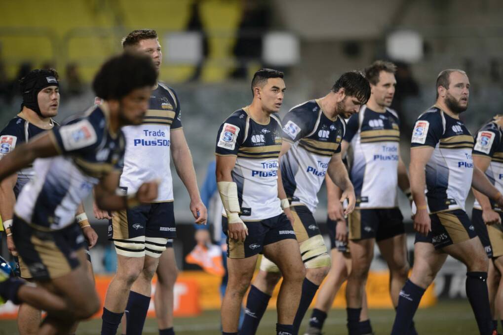 Brumbies players realise that their season has come to an end. Photo: Sitthixay Ditthavong