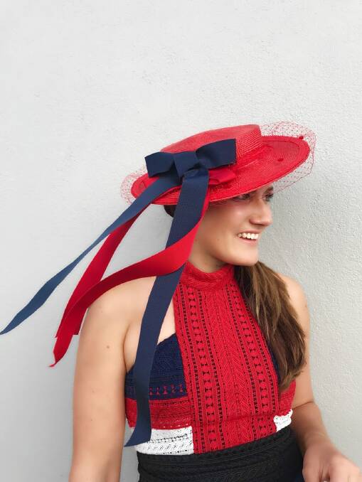 Stephanie Davies of Kingston is all set for the Black Opal Stakes with her striking boater from Canberra milliner Christine Waring Photo: Christine Waring