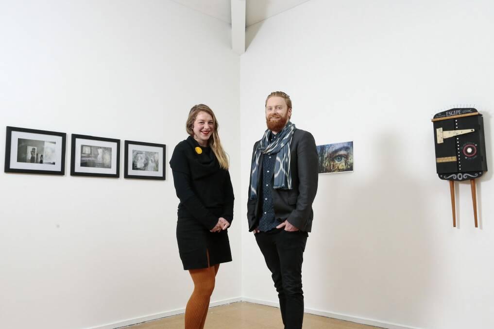 Alexander Boynes and Sabrina Baker with other works at the Canberra Contemporary Art Space's selfie-themed show. Photo: Jeffrey Chan