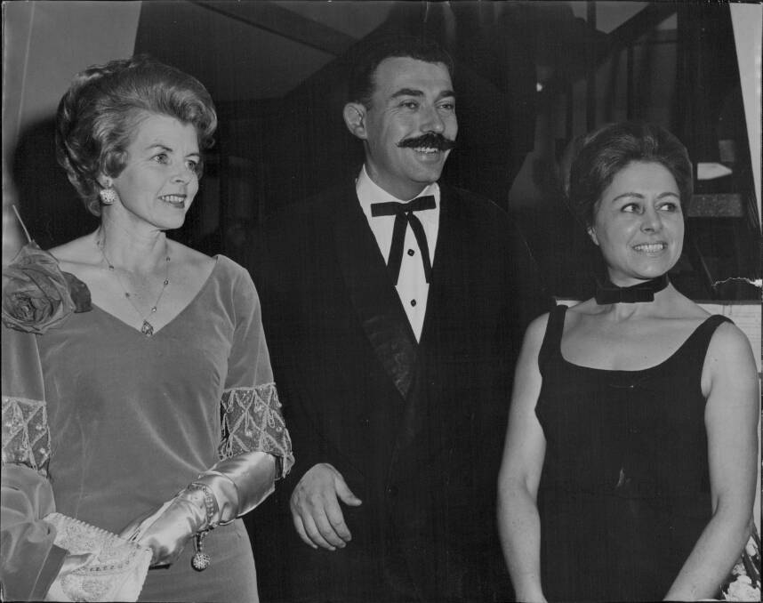 Enrico Taglietti (centre) with wife Francesca (right) and Mrs John Howse at the opening of the Taglietti-designed Associated Chambers of Manufacturers of Australia in 1966. Photo: Fairfax Media