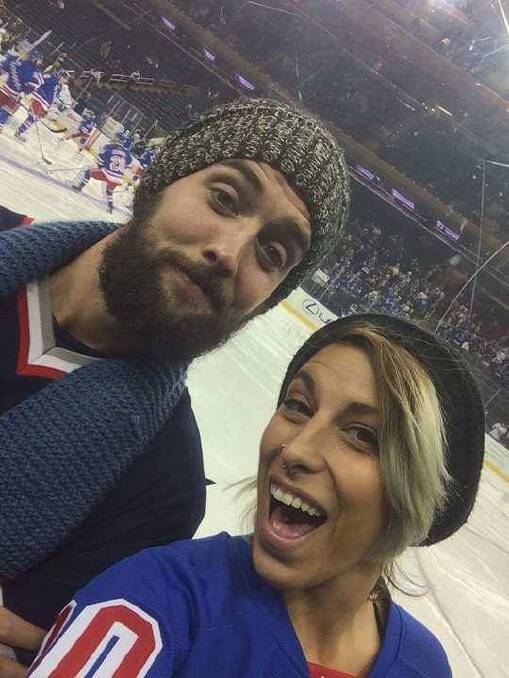 Mr Reid and Ms Kancso at a New York Rangers game; Ms Kancso is trying to raise money for Mr Reid's legal bills. Photo: Supplied