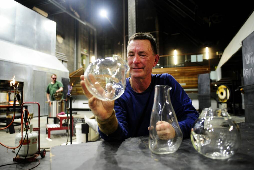 Artist Brian Hirst with some of his pieces that will be on sale at the Winter Glass Market. Photo: Melissa Adams