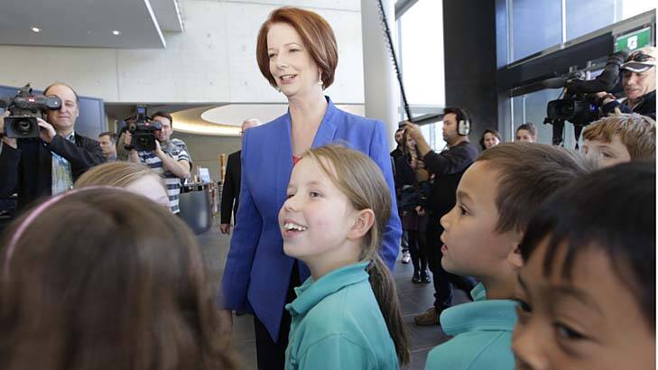 Prime Minister Julia Gillard met school students at the National Gallery of Australia before she addressed the National Press Club on school funding. Photo: Andrew Meares
