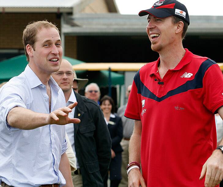 Friends in high places ... Stynes shares a joke with Prince William during last year's royal visit. Photo: Paul Rovere