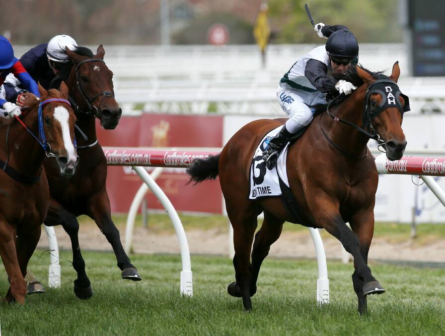 Boom Time spears through the fence to win the Caulfield Cup. Photo: AAP