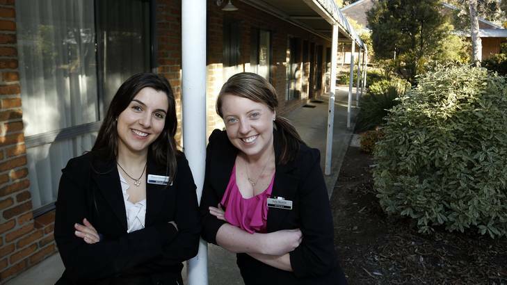 Canberra Raiders fans, Rydges Eagle Hawk Resort sales manager Alyssa Dominioni and food & beverage assistant manager Sally Beattie are part of the team behind the team when the Canberra Raiders stay at the Rydges Eagle Hawk Resort before home games. Photo: Jeffrey Chan