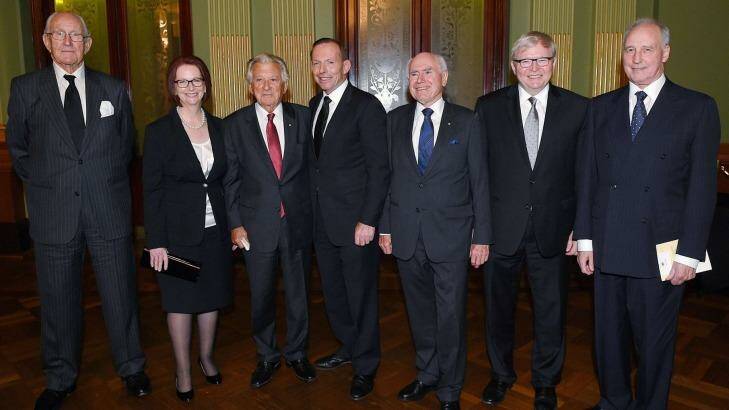 Over in a minute: Prime Minister Tony Abbott (centre) with former Australian prime ministers Malcolm Fraser, Julia Gillard, Bob Hawke, John Howard, Kevin Rudd and Paul Keating, at the completion of the Gough Whitlam memorial service in Sydney. Photo: Dan Himbrechts/Pool photo