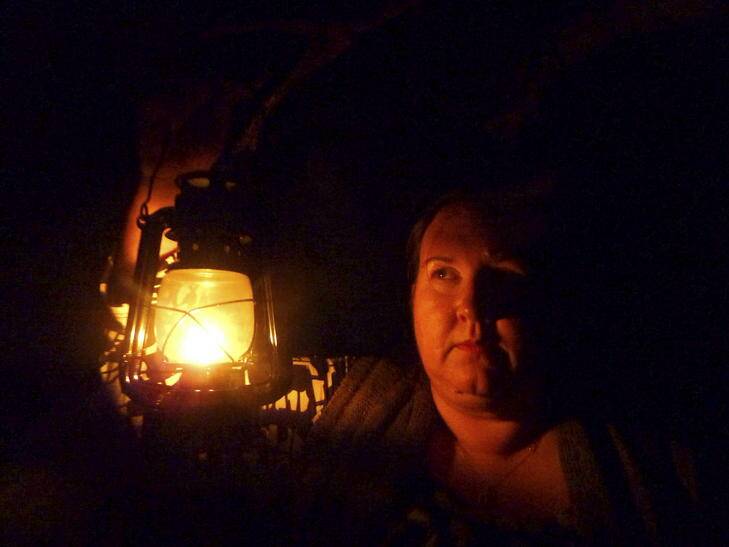 Ghost guide Louise Heatherbrae explores Old Bywong Town by lantern. Photo: Tim the Yowie Man