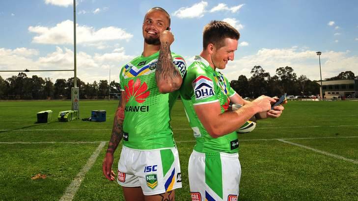 Raiders Sandor Earl and Josh McCrone with new Huawei mobile phones earlier this year. Photo: Colleen Petch