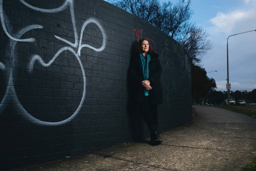 Woden Valley Community Council president Fiona Carrick in front of a wall facing Melrose Dr that is set to become a street art mural. Photo: Rohan Thomson