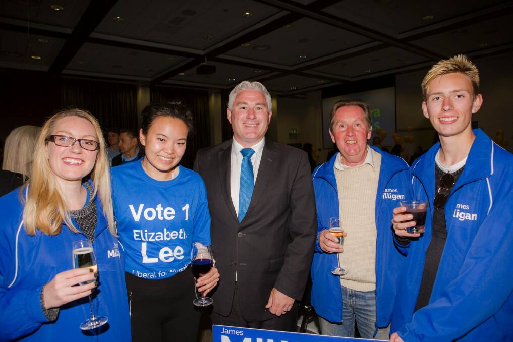 James Milligan (centre) with his wife Katrina (far left) and son Blake (far right) at the Liberal campaign launch at Rex Hotel. Photo: Jamila Toderas