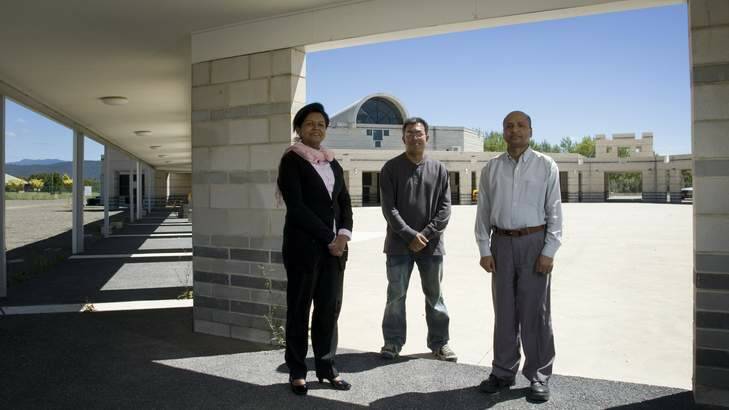Canberra Islamic Centre president Azra Khan, project designer and planner Shamsul Huda and treasurer Ali Akbar are pleased the centre is finally proceeding with stage two of their works, including a new mosque and more library space. Photo: Elesa Lee