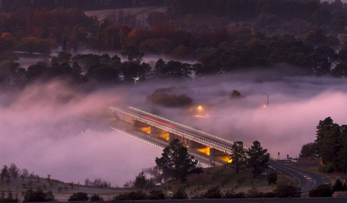 Mist hanging over Scrivener Dam. Photo: Chad Clark