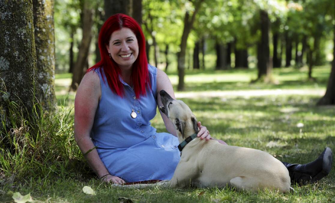 Belconnen Community Council chairwoman Tara Cheyne with her whippet, Cooper, at John Knight Memorial Park. Photo: Graham Tidy