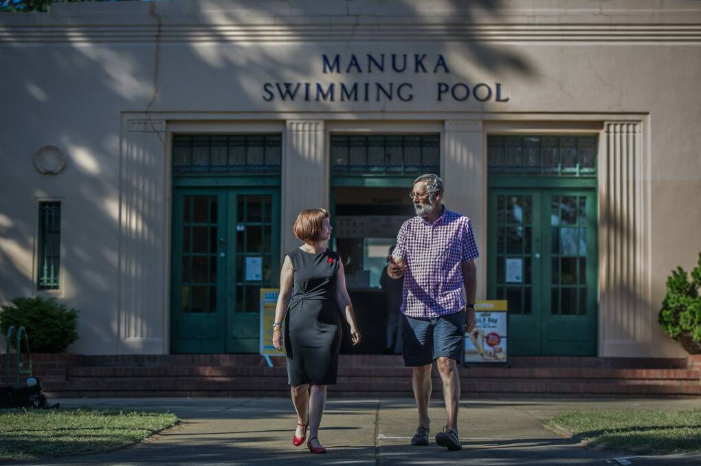 Kingston and Barton Residents group president Rebecca Scouller and member Nick Swain have called for heritage protections to be improved at Manuka Pool and other listed, or nominated, sites across Canberra's inner south. Photo: Karleen Minney