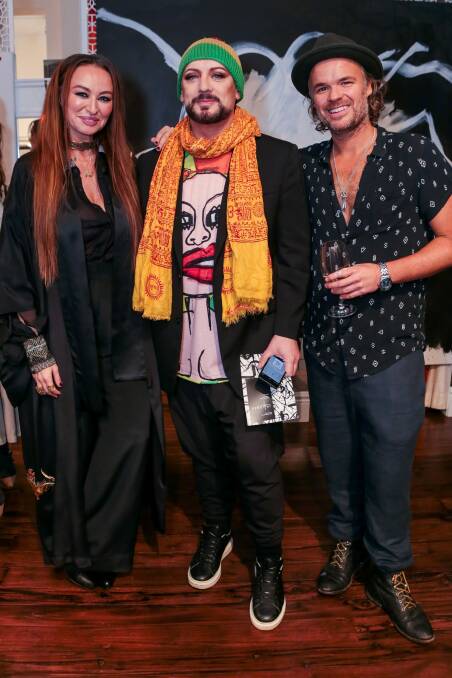Franks with fiance JP Jones (R) and Boy George at Camilla's Bondi Beach Boutique in June. Photo: Kai Godeck