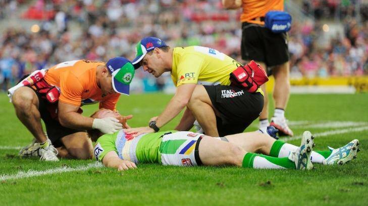 Joel Edwards is seen to by medical staff after being knocked unconscious on Saturday.