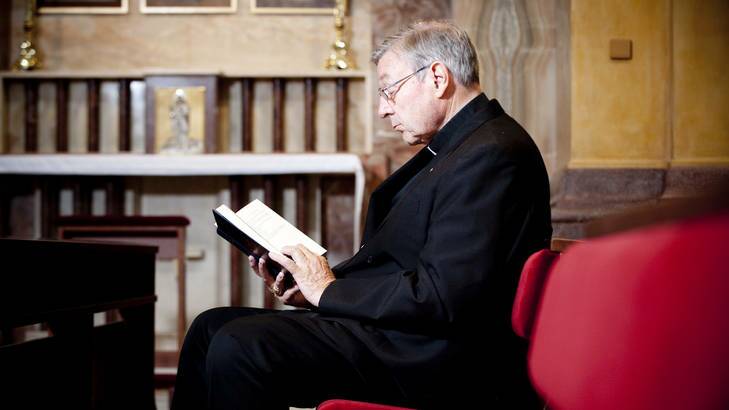 Cardinal George Pell isn't reading <i>The Complete Idiot's Guide To Buddhism</i>. Photo: Susan Wright