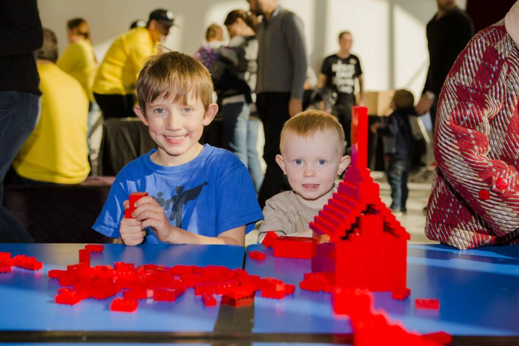 Liam Harvey, 6, and Caelan Neale, 3, busy building at the National Museum event. Photo: Jamila Toderas