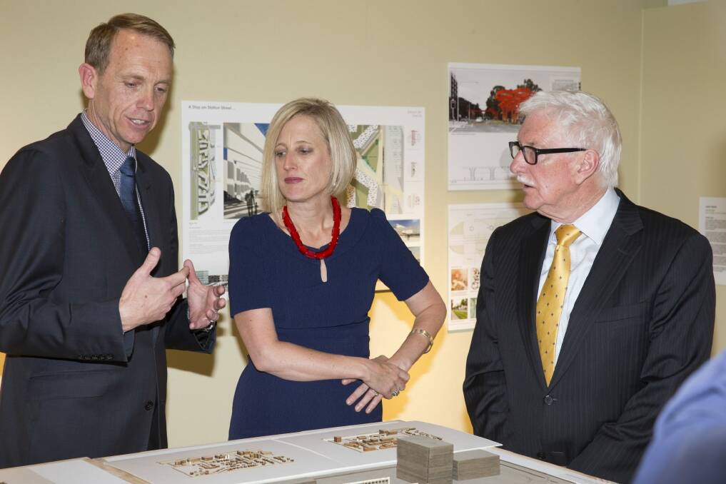 John Fitzgerald, right, with former ACT ministers Simon Corbell and Katy Gallagher. Mr Fitzgerald, head of the light rail board, also becomes chairman of the Suburban Land Agency. Photo: Matt Bedford