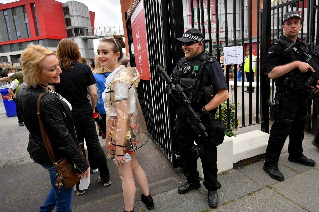 Armed police have been placed around Old Trafford Cricket Ground since the Manchester Arena suicide bombing which killed 22 people.  Photo: Anthony Devlin