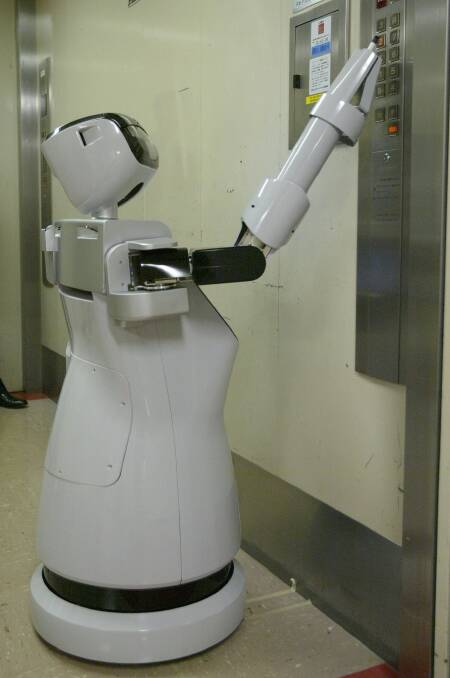A 'service robot' in a Japanese office building in 2004. Photo: AP