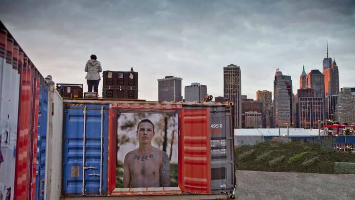 One of Canberra photographer's ?Lee Grant's Belco Pride images displayed against the New York skyline at the recent Photoville festival in Brooklyn. Photo: Jason Florio