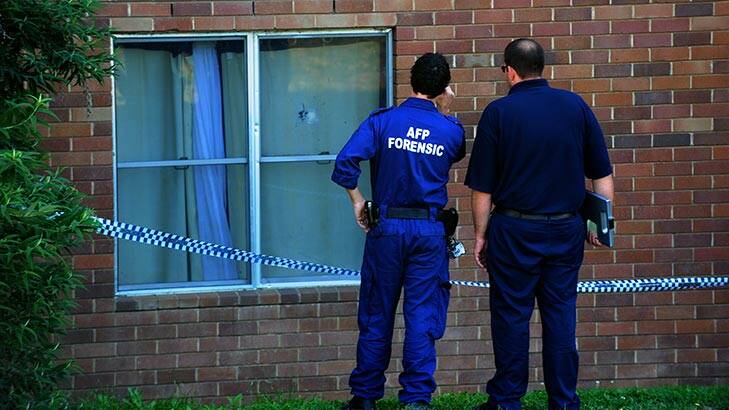 Shooting at Block 4 Stuart Flats, Griffith. ACT forensic police officers at the scene. Photo: Karleen Minney