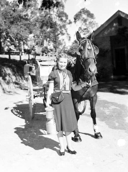 A young woman delivers milk in Sydney in 1942. Before World War II, only men were employed in this role.