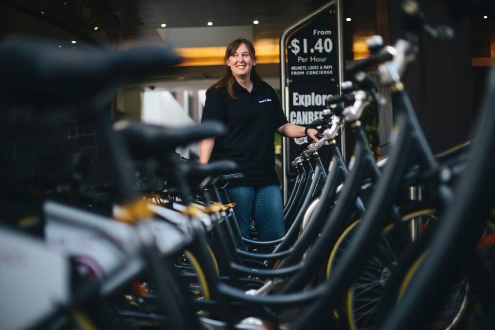 Crown Plaza bike hire owner Kate McDonald with the bikes in Civic. She is hoping to provide new options for cyclists at the lake. Photo: Rohan Thomson