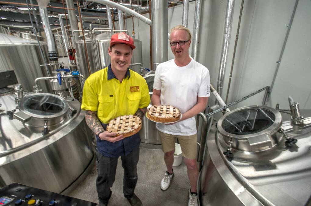 Capital Brewing head brewer Wade Hurley and Three Mills Bakery head baker Justin King collaborate on a special cherry pie Christmas ale using real cherry pies.  Photo: Karleen Minney